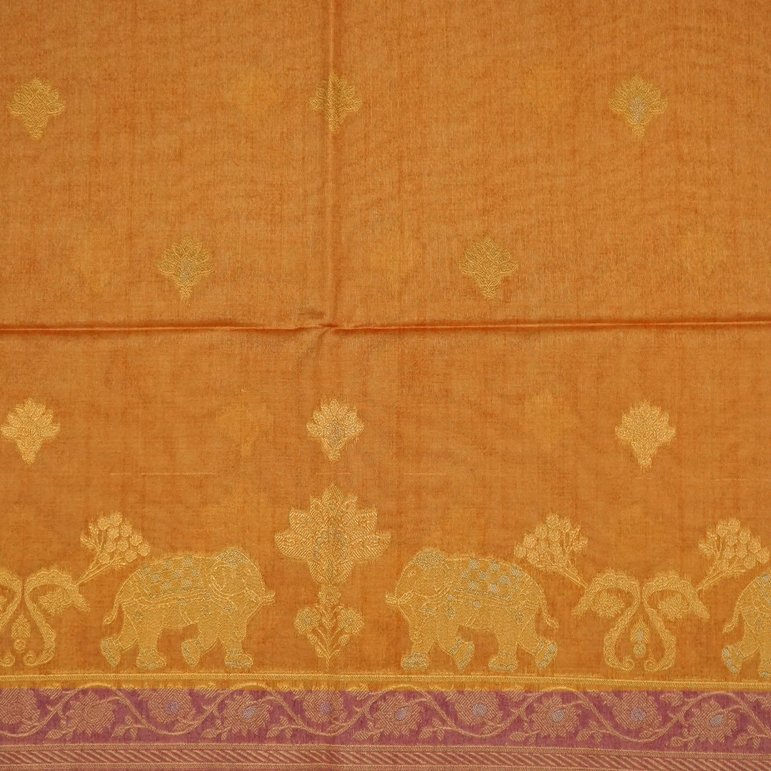 Golden Amber Ambari Silk Saree with Dusky Mauve border and Zari works.