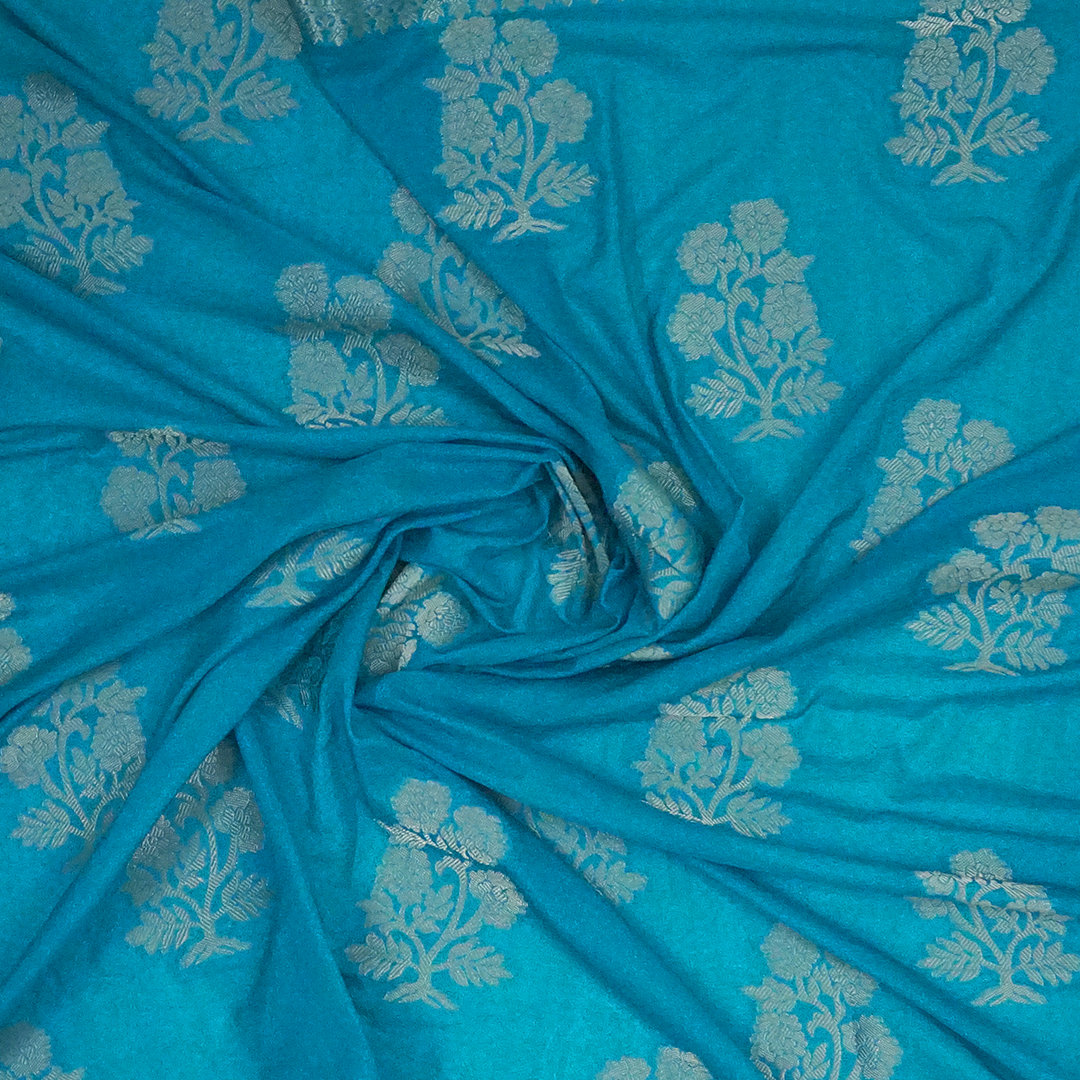 Neera Silk Saree in Vibrant Turquoise Blue with Floral works