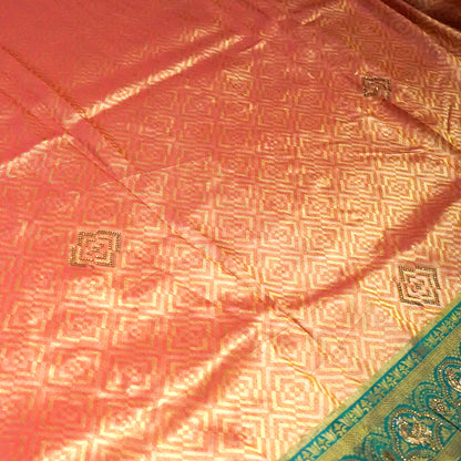 Peach-orange Raj Virasat Silk saree with Deep purple base and heavy embroidery.