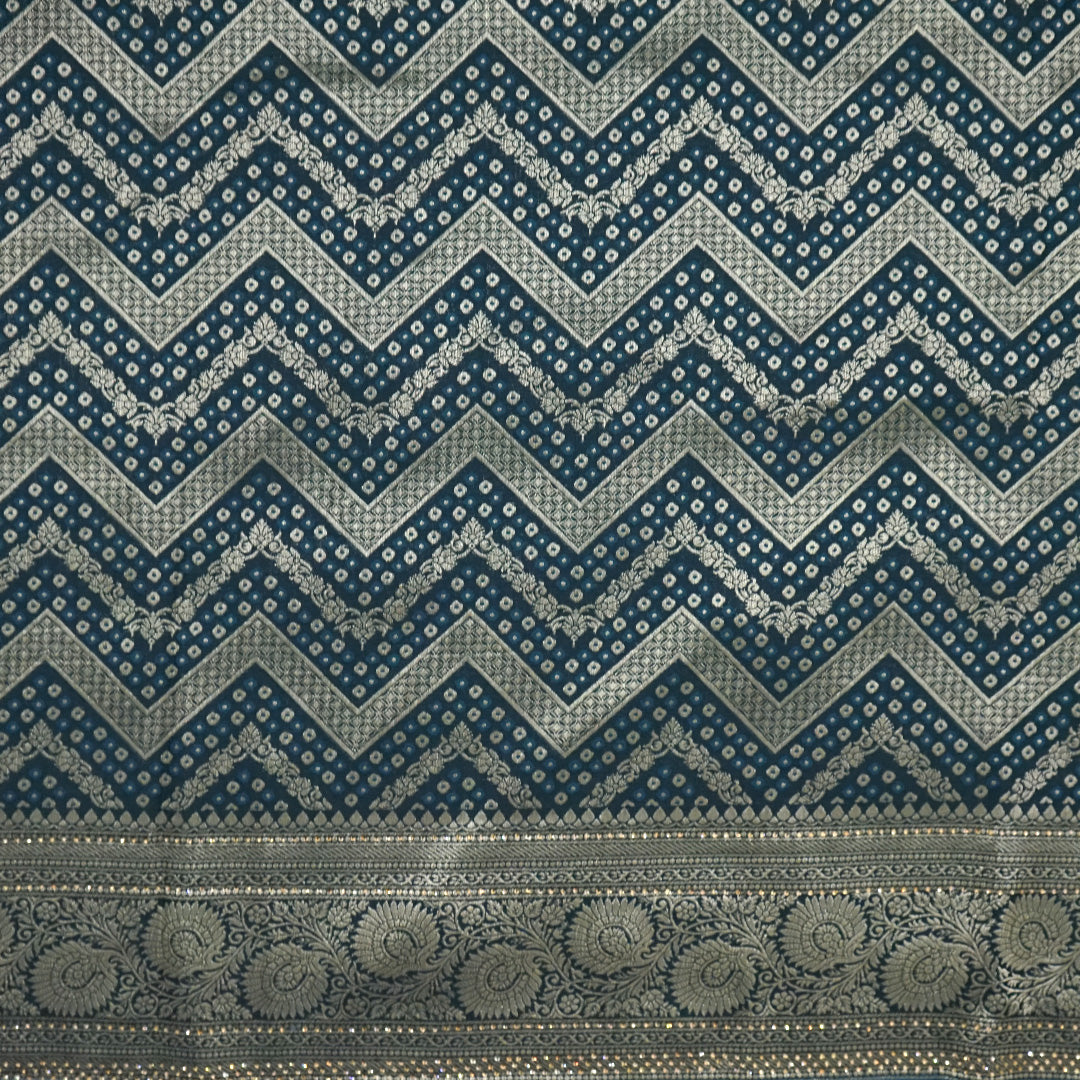 Tarani Silk saree in deep navy blue shade with a rich golden zari weave.