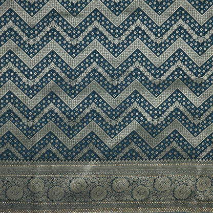 Tarani Silk saree in deep navy blue shade with a rich golden zari weave.