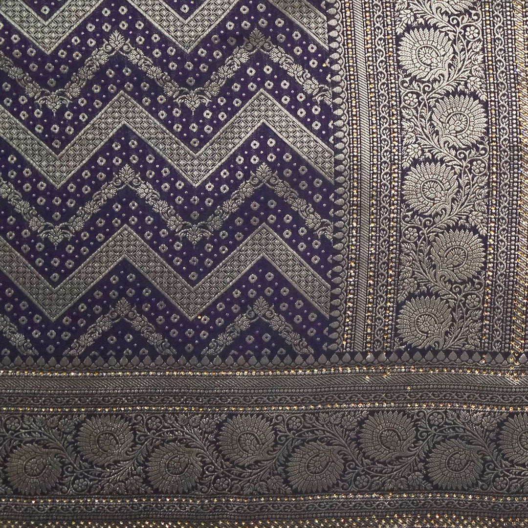 Tarani Silk saree in royal deep purple shade with a rich golden zari weave.