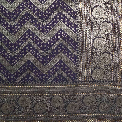 Tarani Silk saree in royal deep purple shade with a rich golden zari weave.