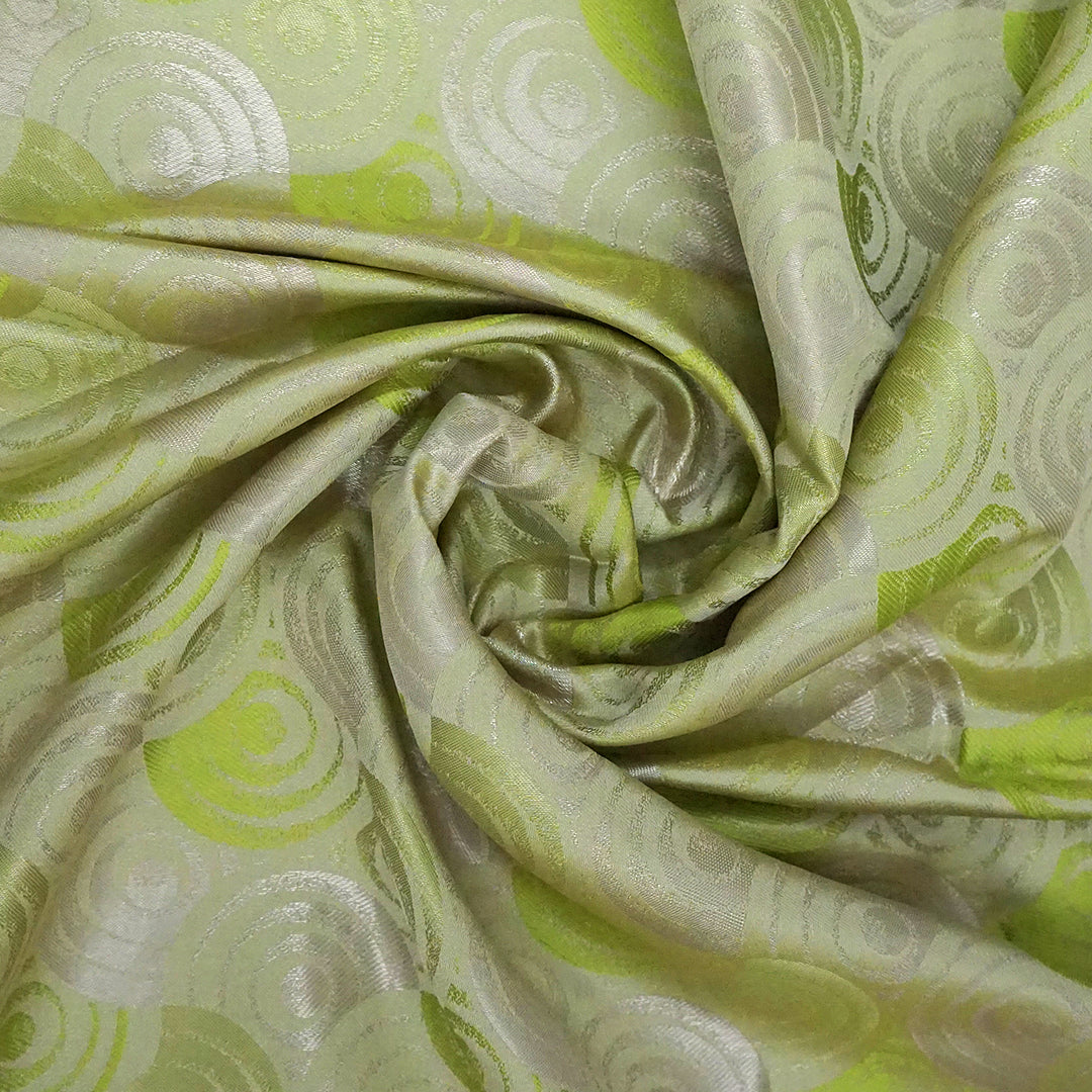 Soothing light olive green shade Suhani Silk with a subtle golden sheen