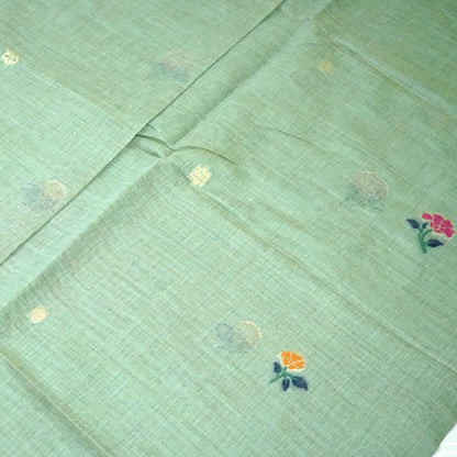 Varnica Tussar Soft pastel green shade with a subtle golden shimmer