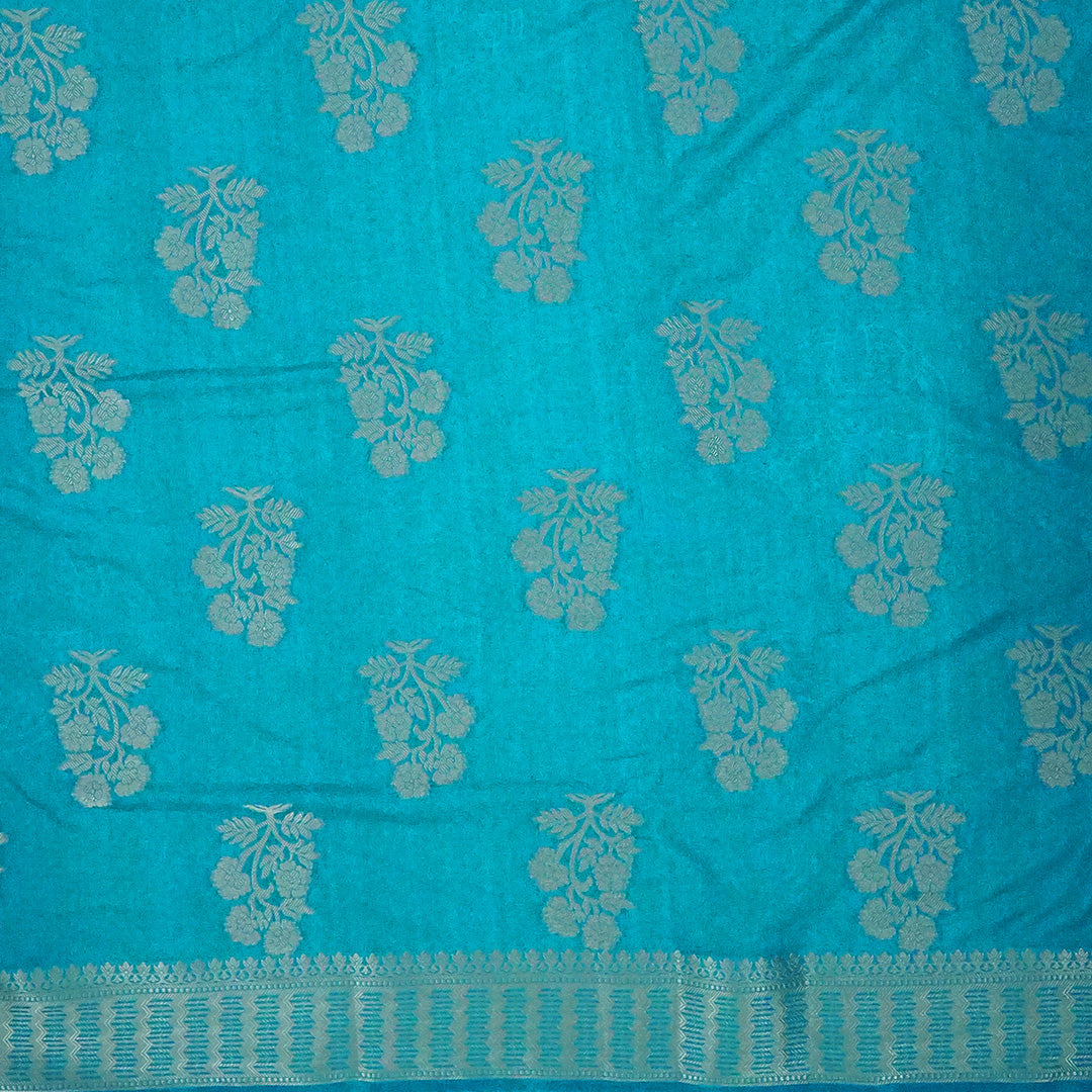 Neera Silk Saree in Vibrant Turquoise Blue with Floral works