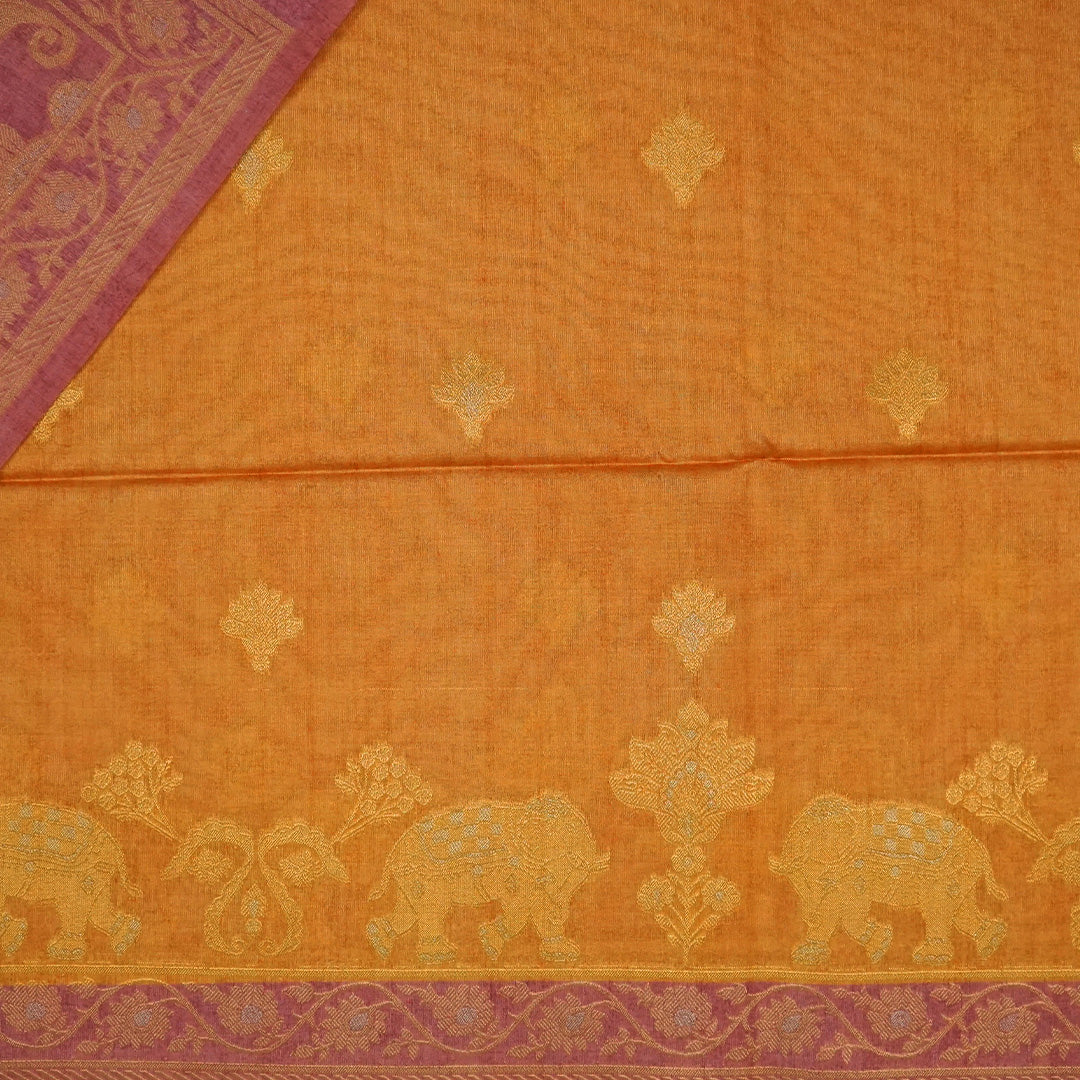 Golden Amber Ambari Silk Saree with Dusky Mauve border and Zari works.
