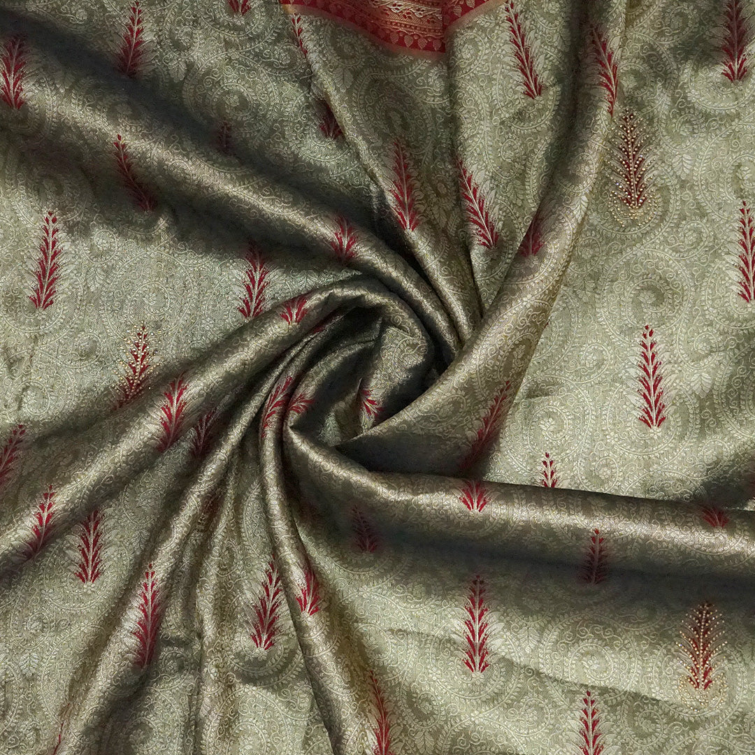 Madhur Bela Muted olive green shade with an elegant golden sheen