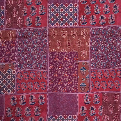 Tanvi in Multicoloured patterns in Rich Maroon Base with hues of Blue, White and Orange