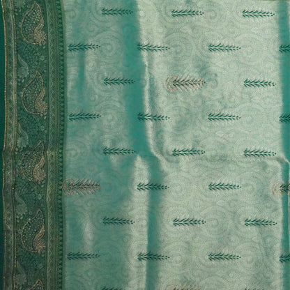 Madhur Bela soothing teal-green hue shade with a golden undertone.