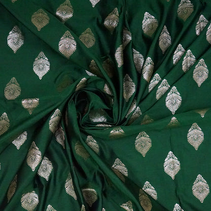Rithvi Satin Emerald-green shade color adorned with intricate golden zari embroidery