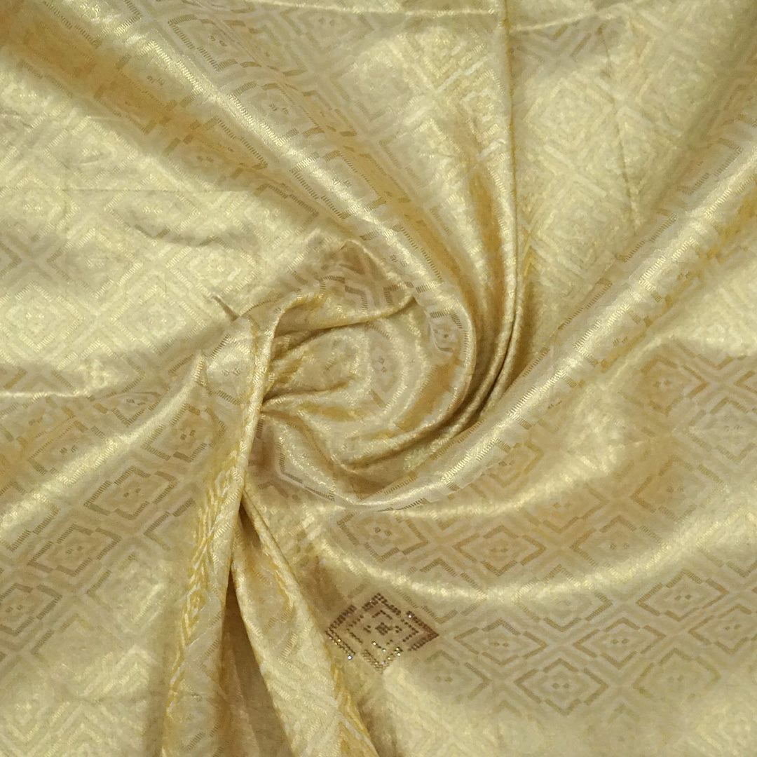 Golden cream Raj Virasat Silk saree with Deep purple base and heavy embroidery.