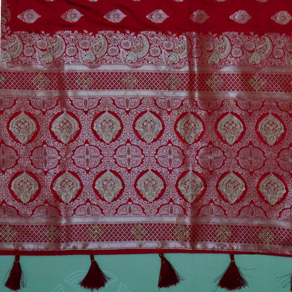Rithvi Satin Deep red color adorned with intricate golden zari embroidery