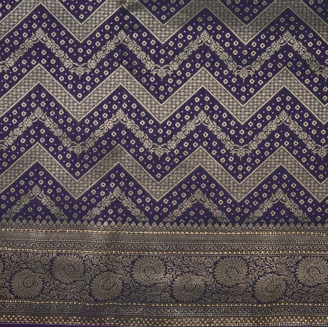 Tarani Silk saree in royal deep purple shade with a rich golden zari weave.