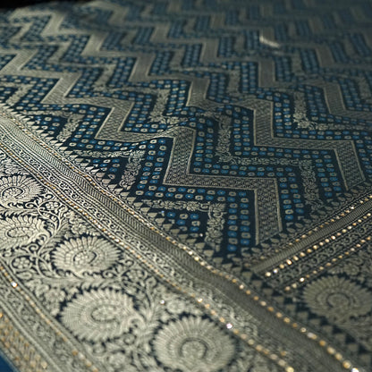 Tarani Silk saree in deep navy blue shade with a rich golden zari weave.