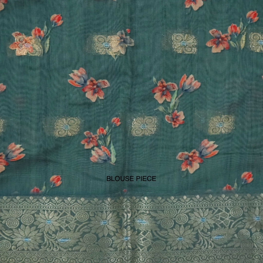Hirakshi Silk in Teal Blue base with floral prints