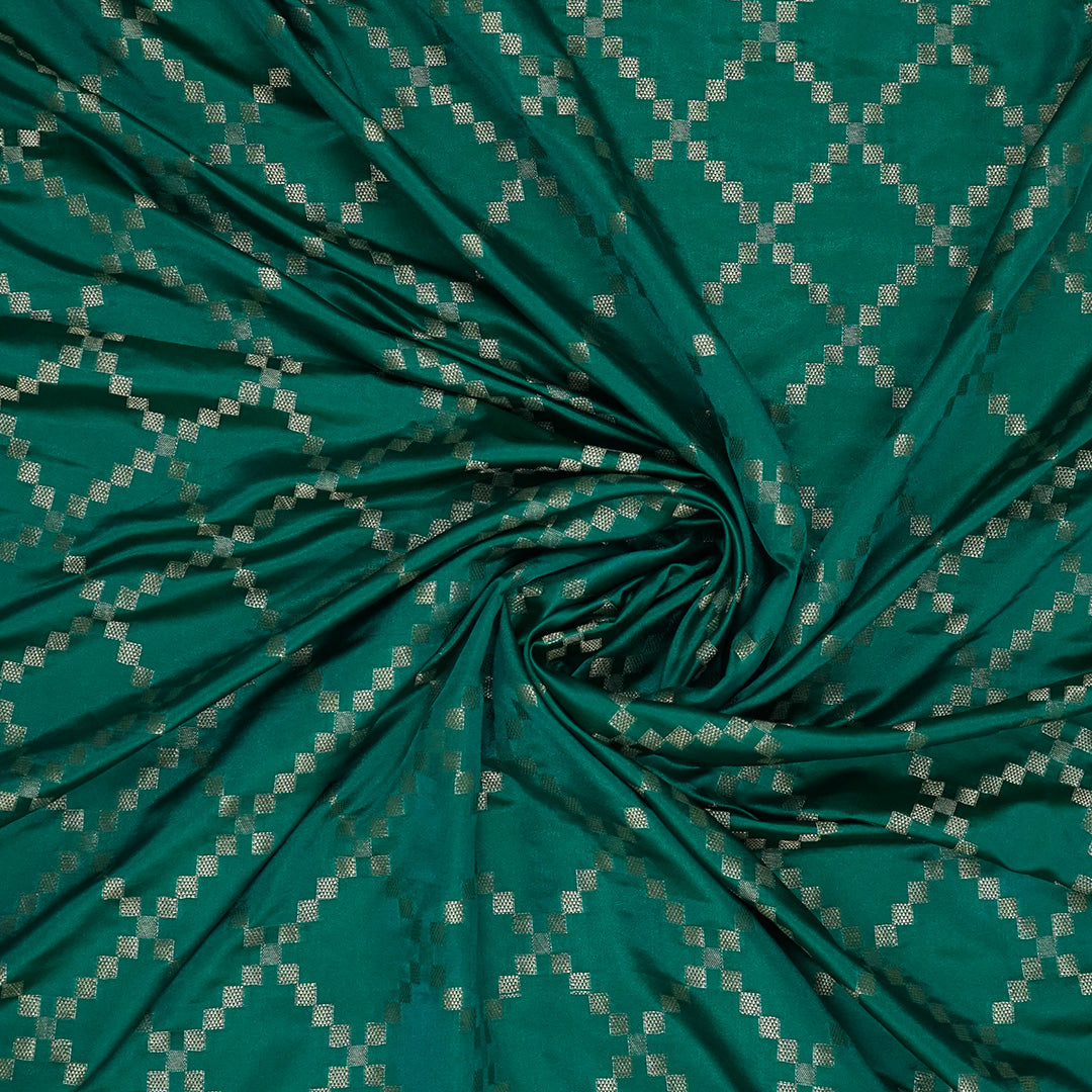 Samrudhi silk saree in vibrant combination of emerald green and lime green with a lustrous Banarasi silk finish.