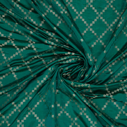 Samrudhi silk saree in vibrant combination of emerald green and lime green with a lustrous Banarasi silk finish.
