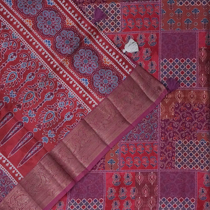 Tanvi in Multicoloured patterns in Rich Maroon Base with hues of Blue, White and Orange