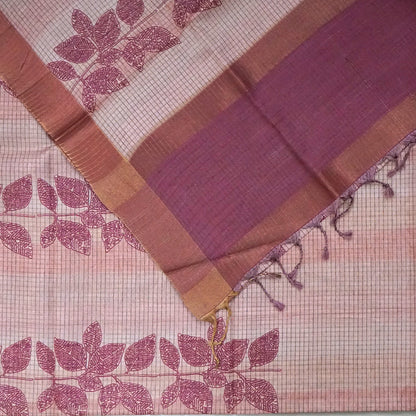 Harini Tussar in soft beige base with maroon leaf motifs and a matching brownish-maroon border, creating an elegant and earthy look.