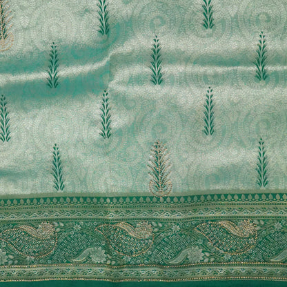 Madhur Bela soothing teal-green hue shade with a golden undertone.