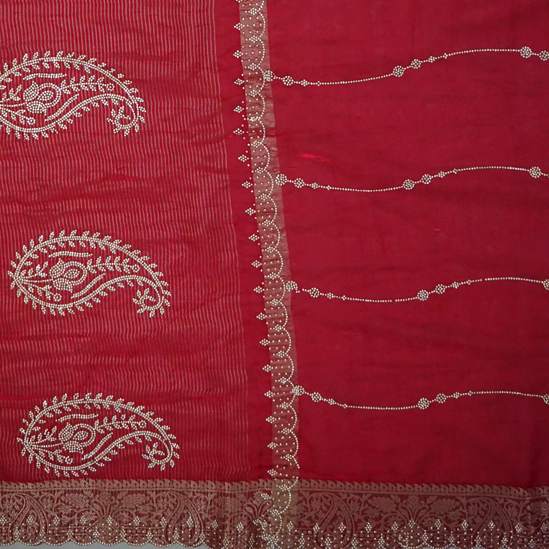 Ratnalekha silk saree in vibrant deep red base accentuated with intricate gold zari embroidery,
