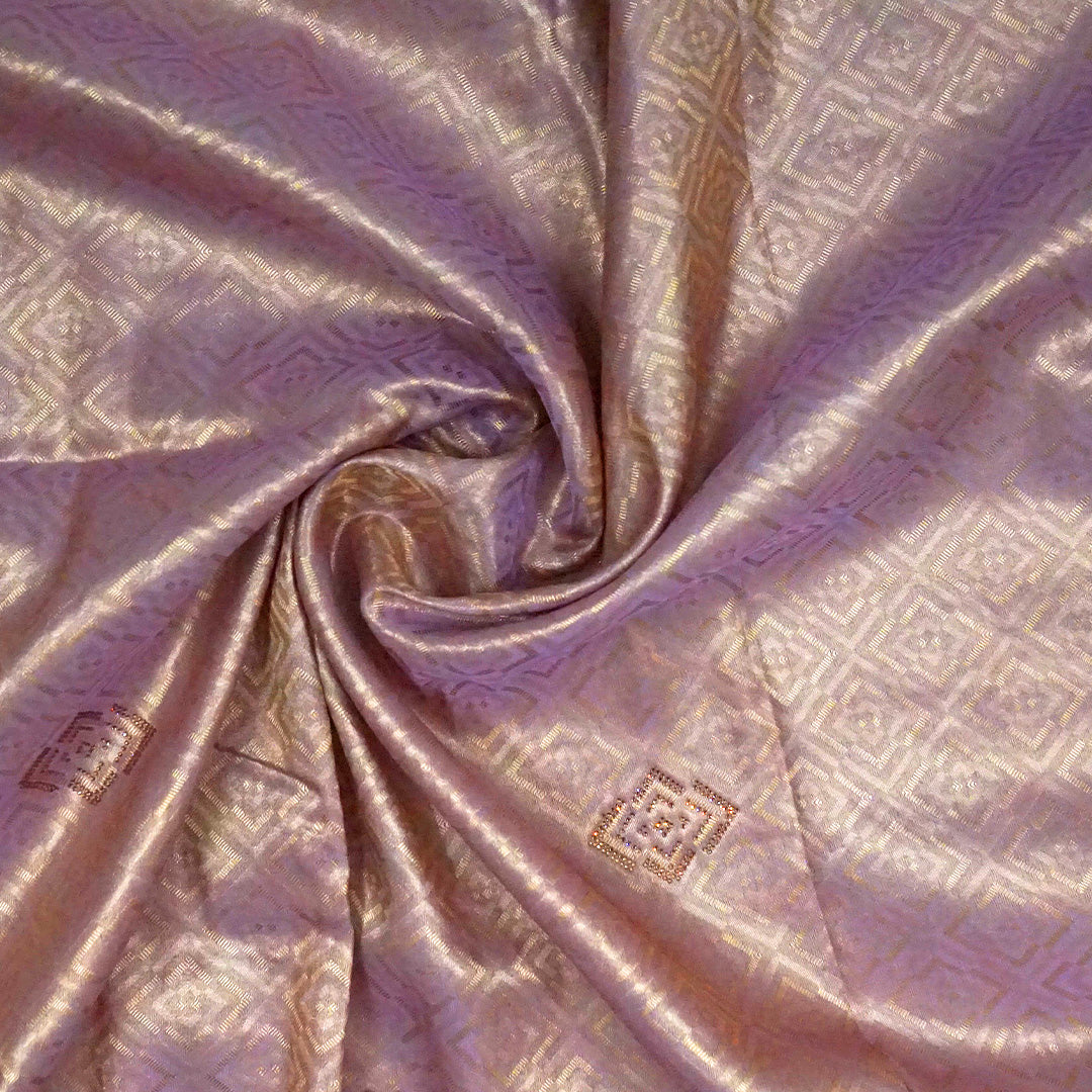 Royal lavender-pink Raj Virasat silk saree with floral motifs and zari works