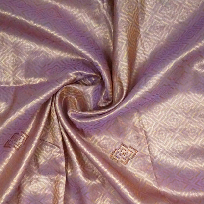 Royal lavender-pink Raj Virasat silk saree with floral motifs and zari works