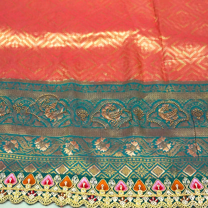 Peach-orange Raj Virasat Silk saree with Deep purple base and heavy embroidery.