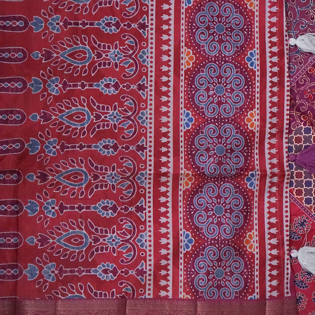 Tanvi in Multicoloured patterns in Rich Maroon Base with hues of Blue, White and Orange