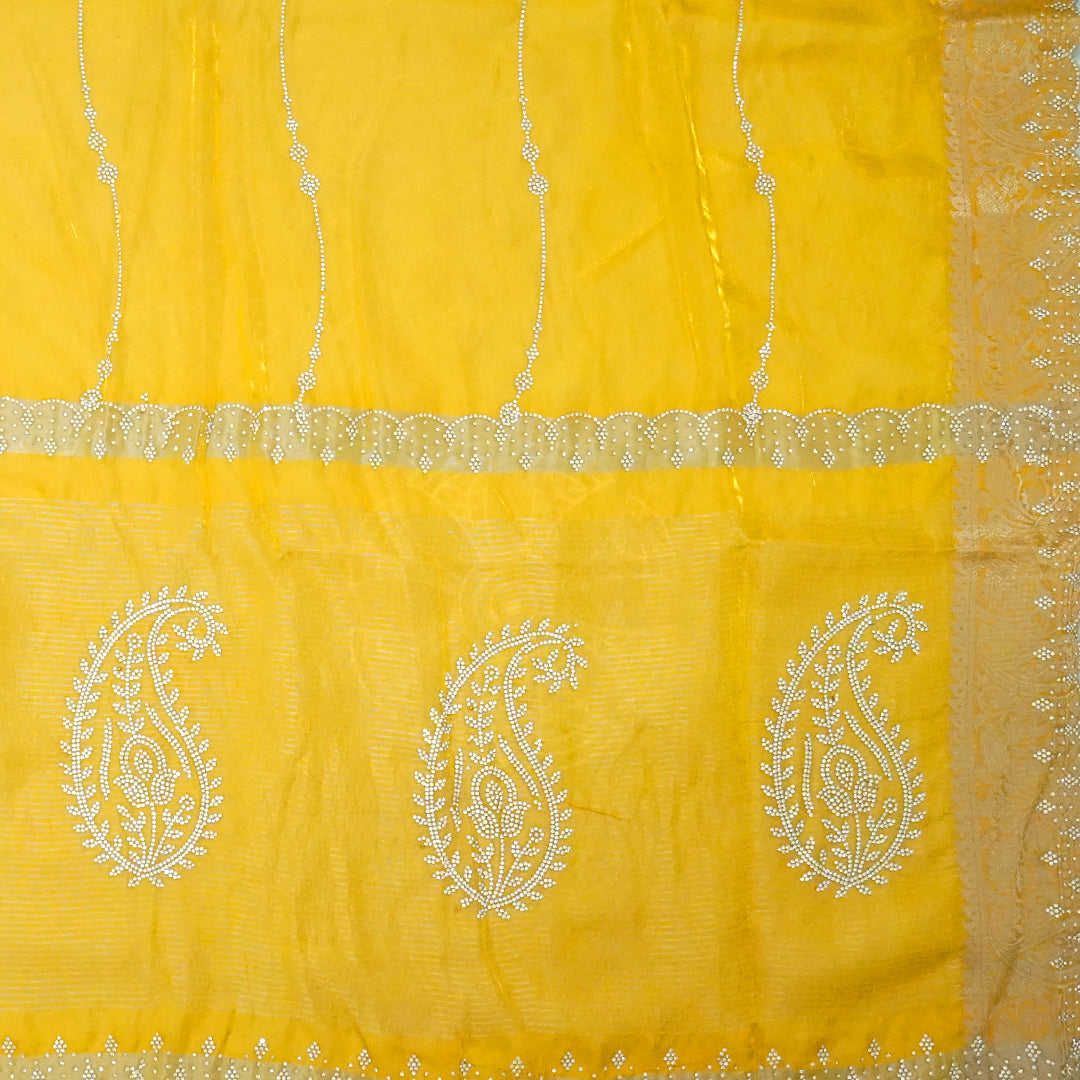 Ratnalekha Silk saree in rich golden yellow base highlighted with intricate silver zari embroidery
