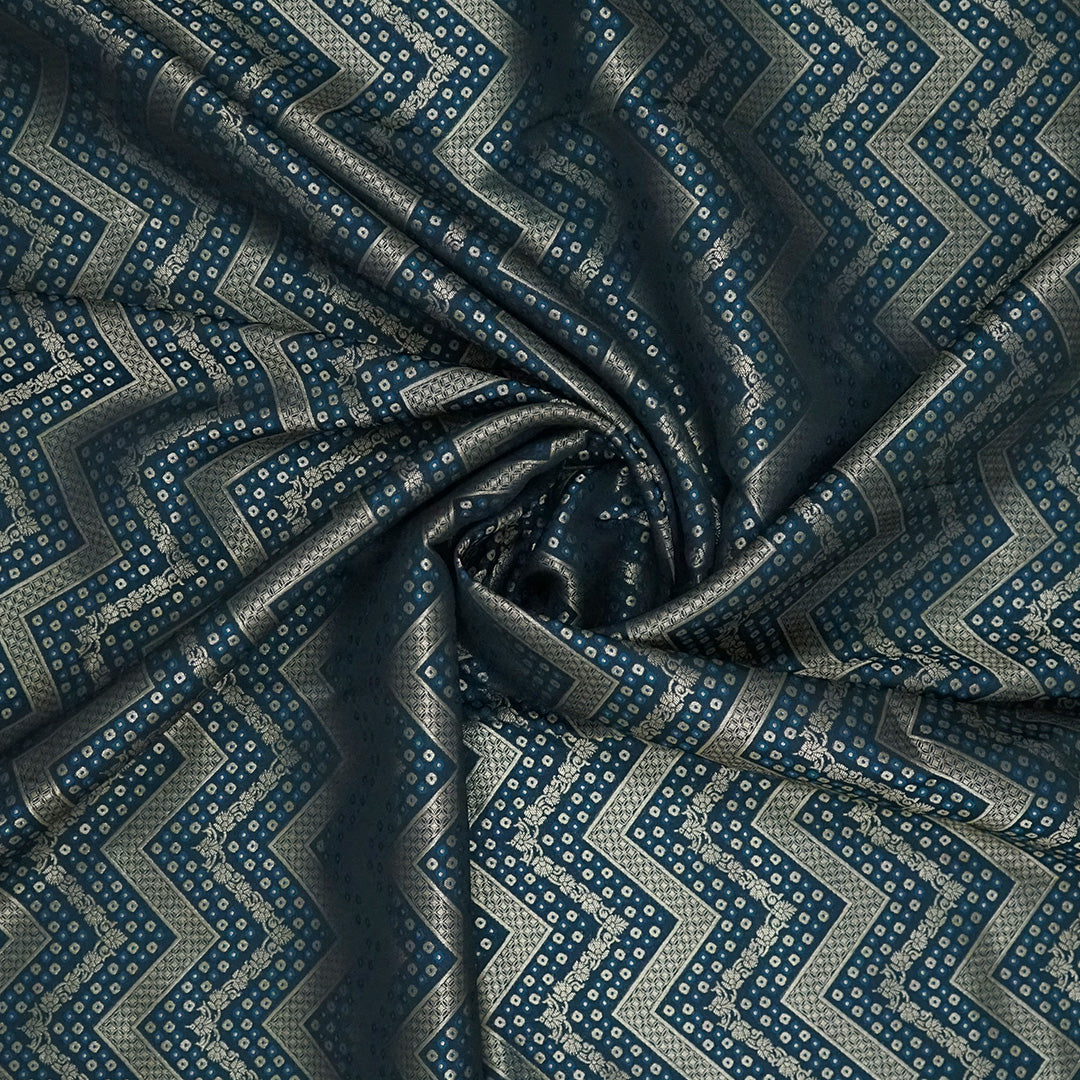 Tarani Silk saree in deep navy blue shade with a rich golden zari weave.