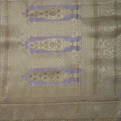 Vedika Silk saree in soft pastel pink shade with a luxurious golden zari weave.