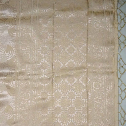 soft beige-gold shade Suhani Silk with a subtle sheen