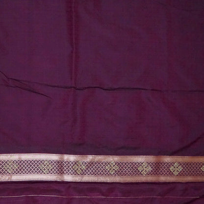 Rithvi Satin Deep plum shade color adorned with intricate golden zari embroidery