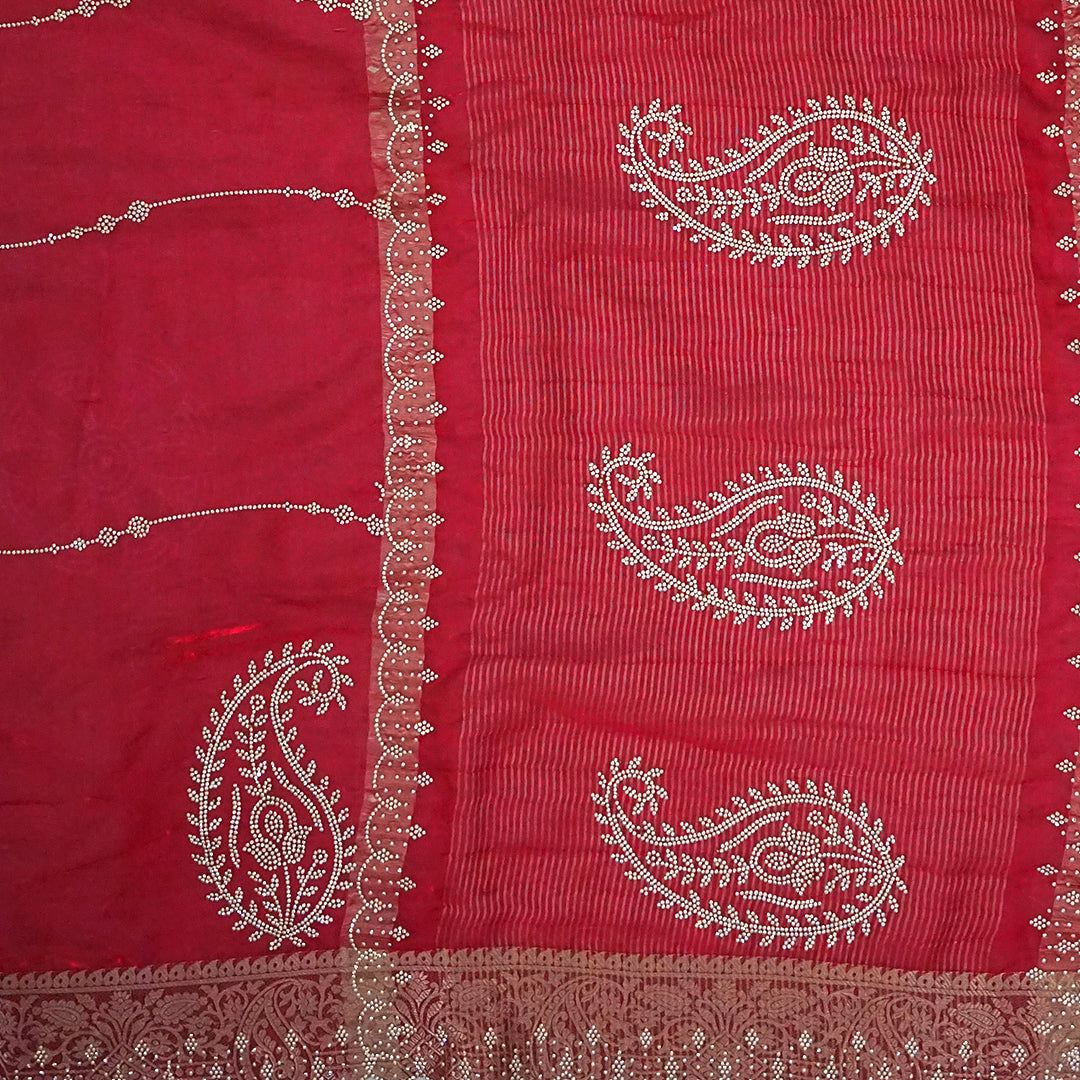 Ratnalekha silk saree in vibrant deep red base accentuated with intricate gold zari embroidery,