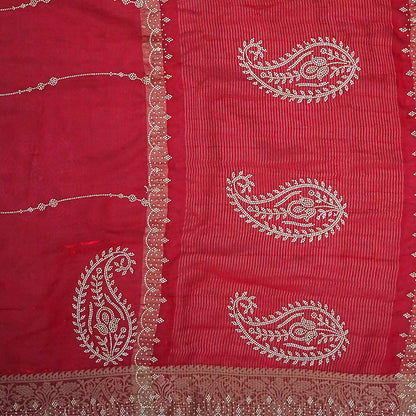 Ratnalekha silk saree in vibrant deep red base accentuated with intricate gold zari embroidery,