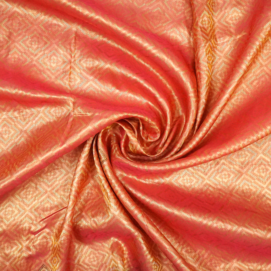 Peach-orange Raj Virasat Silk saree with Deep purple base and heavy embroidery.