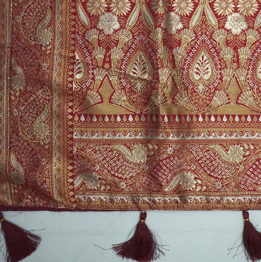 Madhur Bela Muted olive green shade with an elegant golden sheen