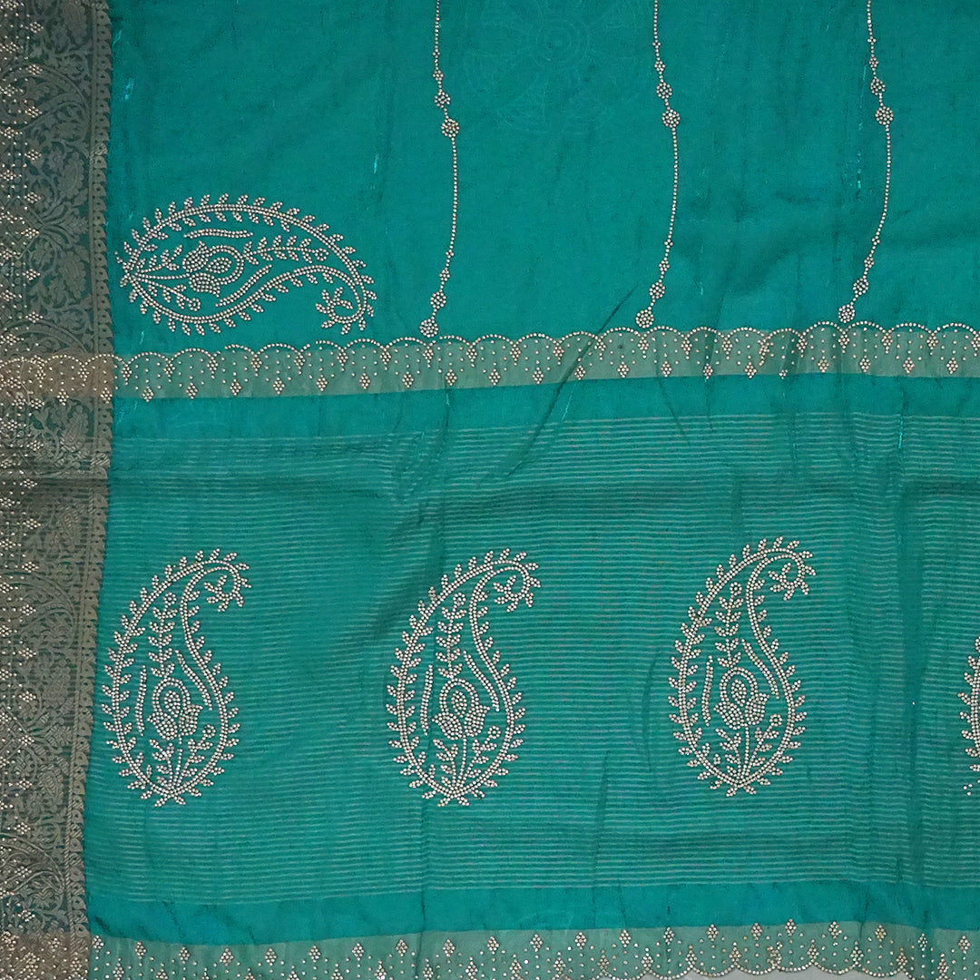 Ratnalekha Silk saree in rich emerald-green base accentuated with intricate gold zari work
