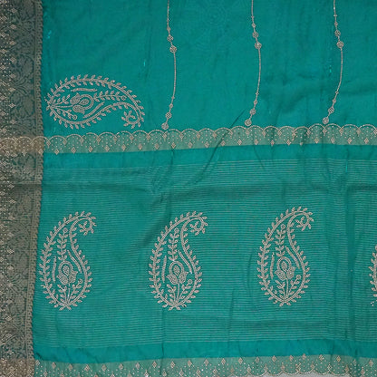 Ratnalekha Silk saree in rich emerald-green base accentuated with intricate gold zari work