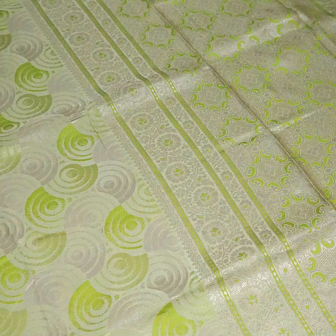 Soothing light olive green shade Suhani Silk with a subtle golden sheen