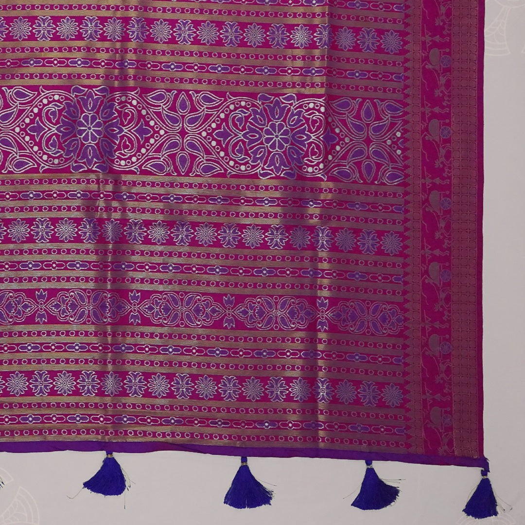 Royal purple and magenta pink Stravi Silk, highlighted with shimmering silver zari detailing.