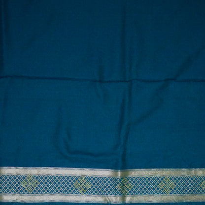 Rithvi Satin Aqua blue color adorned with intricate golden zari embroidery