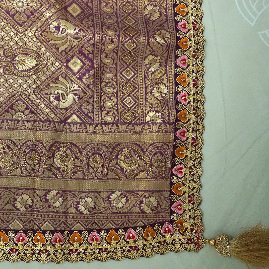 Golden cream Raj Virasat Silk saree with Deep purple base and heavy embroidery.