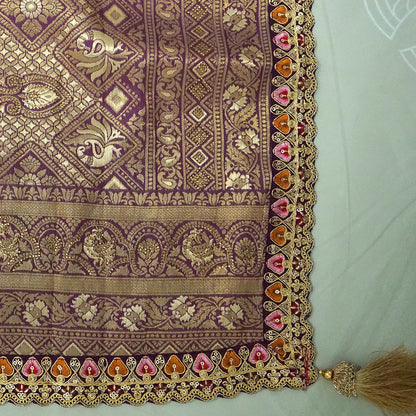 Golden cream Raj Virasat Silk saree with Deep purple base and heavy embroidery.