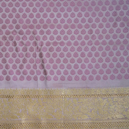 Vedika Silk saree in soft pastel pink shade with a luxurious golden zari weave.