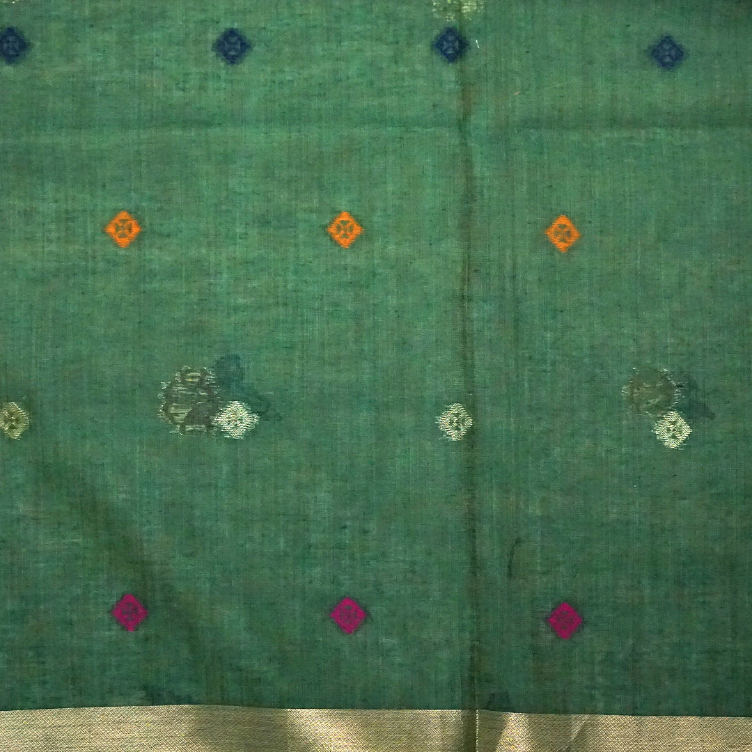 Varnica Tussar Soft pastel green shade with a subtle golden shimmer