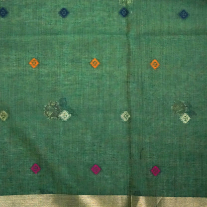 Varnica Tussar Soft pastel green shade with a subtle golden shimmer