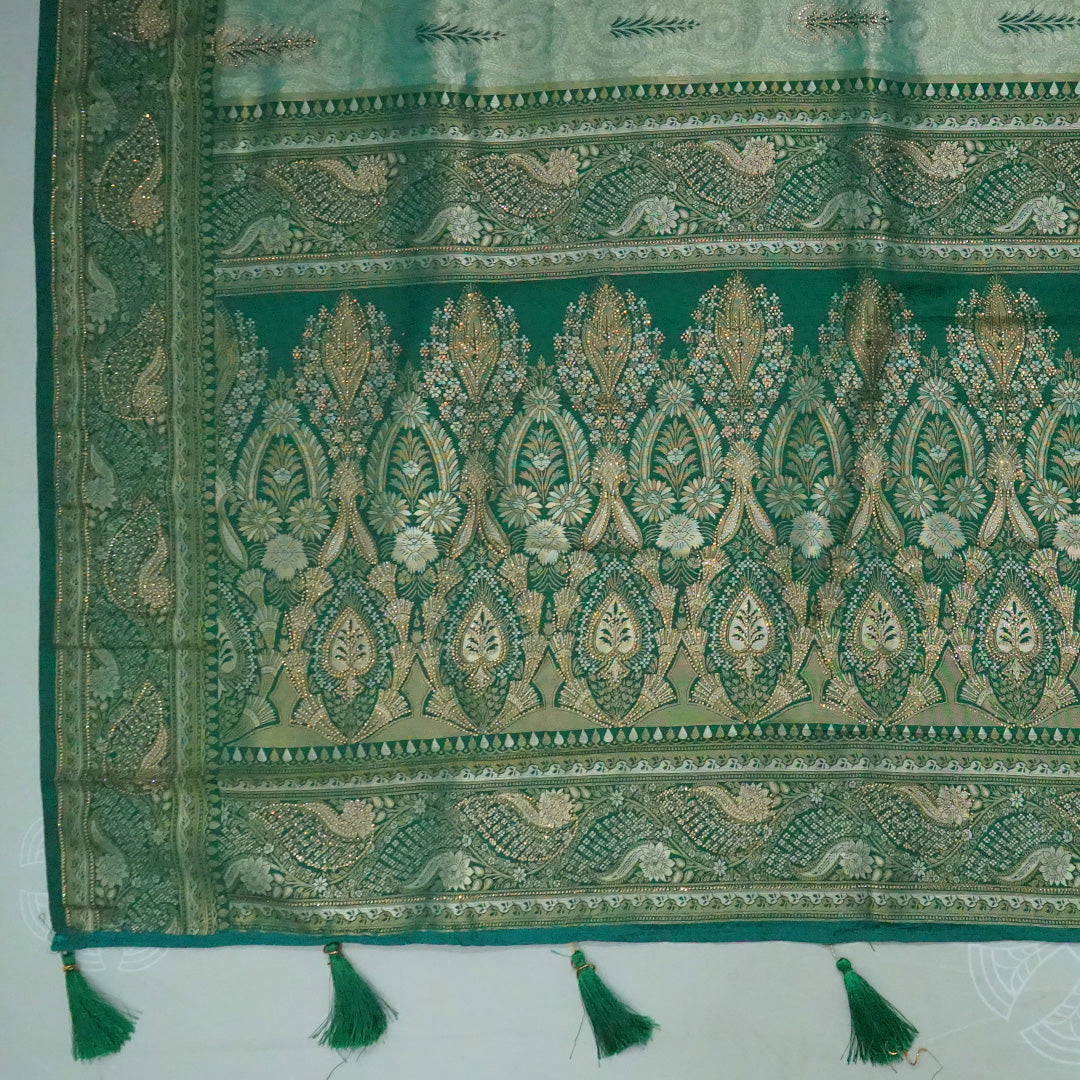 Madhur Bela soothing teal-green hue shade with a golden undertone.